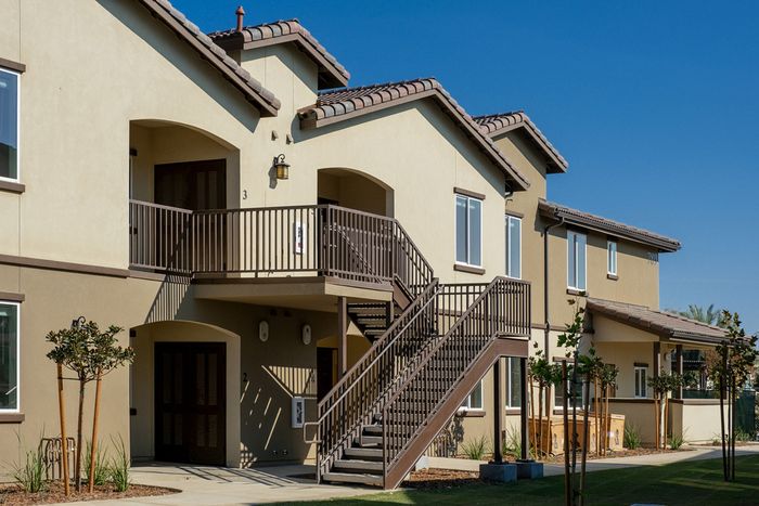 exterior of two story apartment building at Grapevine Villa