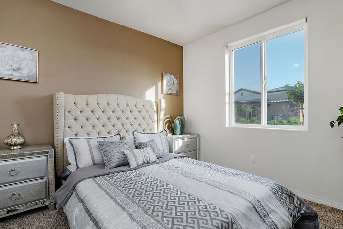 bedroom with carpeted flooring at Grapevine Villa