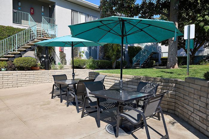 Picnic tables at pools at Mission Arbor, San Diego, CA