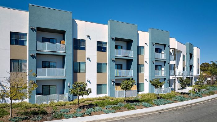 Modern Studio Apartments in Linda Vista, San Diego, CA - Citrino - Exterior with Planted Trees, Sidewalk Access, and Blue Skies
