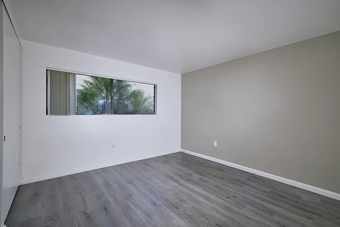 Bedroom with vinyl plank flooring