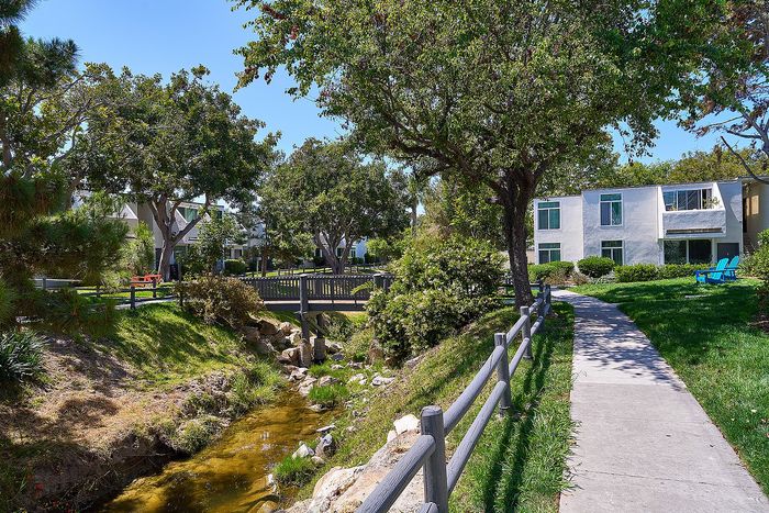 walking path with bridge between community