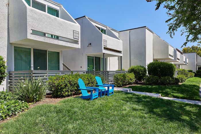 adirondack chairs in grass
