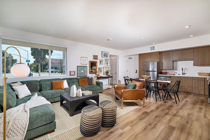 Spacious living, dining, and kitchen of Dezi Apartments in Serra Mesa, San Diego, CA