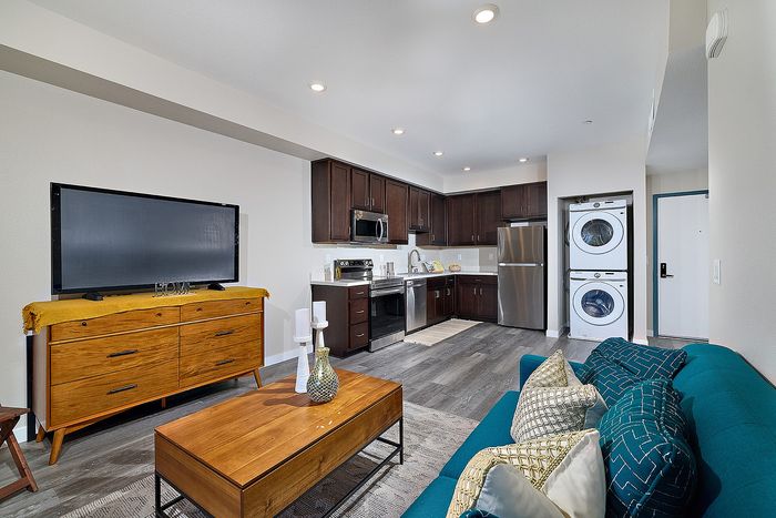 Living room and Kitchen at Citrino Apartments in Linda Vista, San Diego, CA