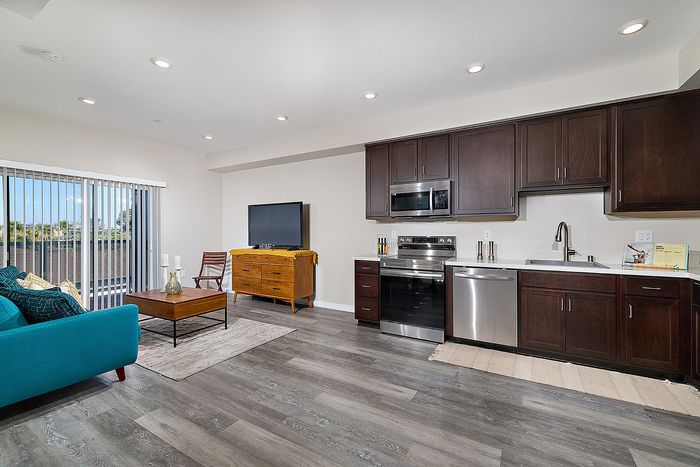 Living room and Kitchen at Citrino Apartments in Linda Vista, San Diego, CA
