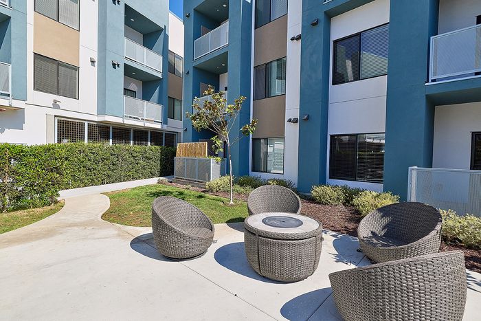 Community BBQ Grill and lounge area at Citrino Apartments in Linda Vista, San Diego, CA