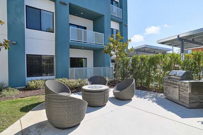 Community BBQ Grill and lounge area at Citrino Apartments in Linda Vista, San Diego, CA