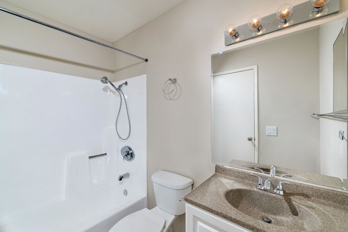Bathroom with tub, shower, and sink