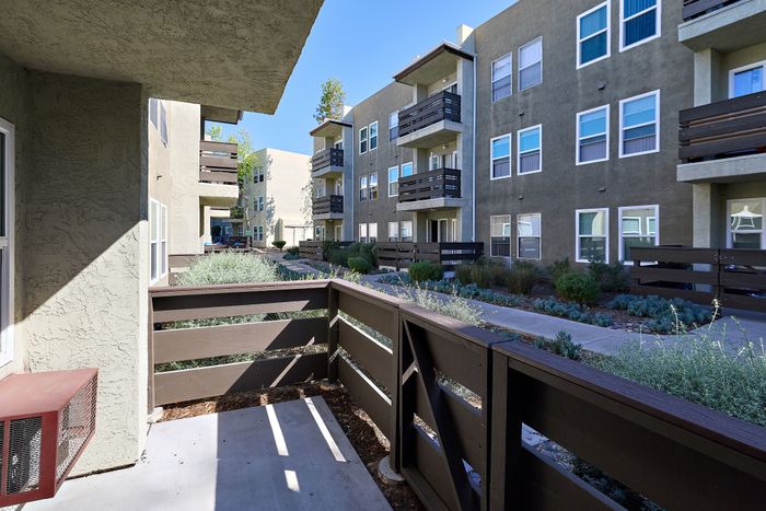 Balcony showing apartments and path with greenery