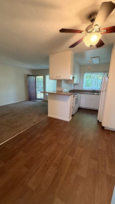 Dining room and kitchen at Vogue Manor