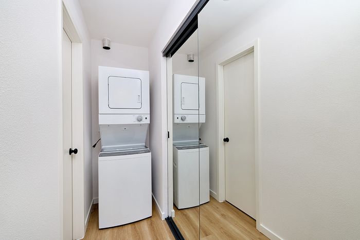Washer and dryer and closet in the one-bedroom at Melrose Canyon