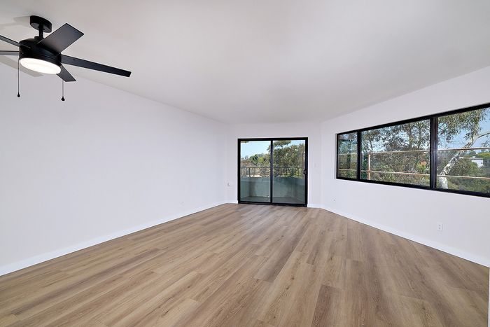 Living Room of Unit 28 at Melrose Canyon with a patio, ceiling fan and windows