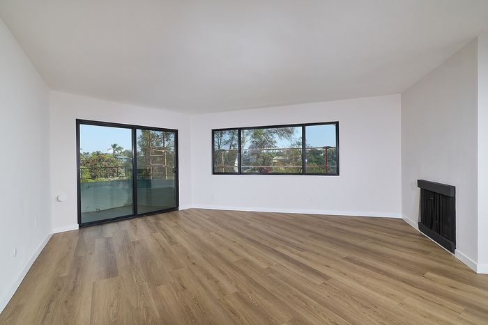 Living Room of Unit 28 at Melrose Canyon with a patio, ceiling fan and windows