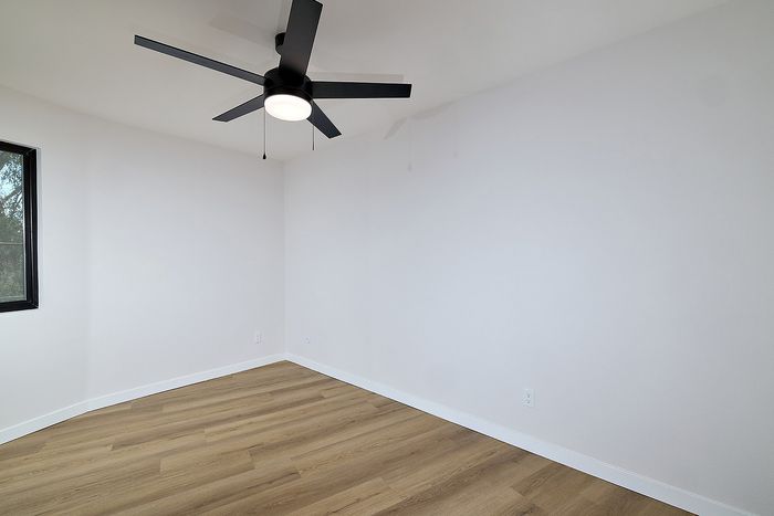 Dining nook in unit 28 at Melrose Canyon with a ceiling fan