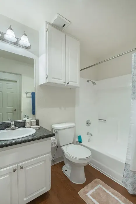 Updated bathroom with white cabinetry and sink at Elan - Scripps Terrace.