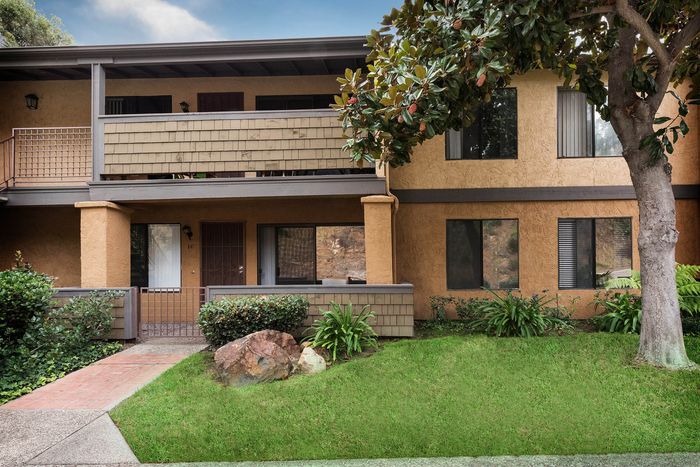Apartment exterior with private balconies at Elan - Scripps Terrace.