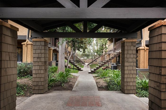 Shaded walkway with classic architecture at Elan - Scripps Terrace.