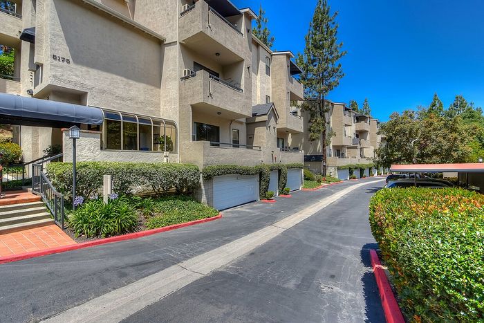 Apartment exterior featuring private resident garages at Elan - Terraza La Jolla