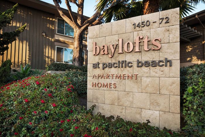 Community monument sign at the entrance of Elan - Baylofts in San Diego