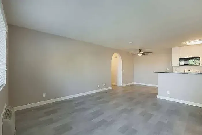 Open living space featuring modern vinyl plank flooring at Elan - poway hills.