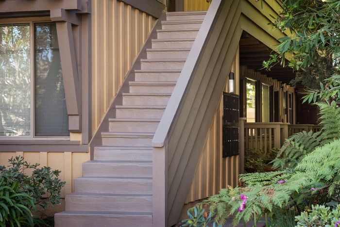 Wooden staircase and professional landscaping at Elan - beachcomber la jolla.