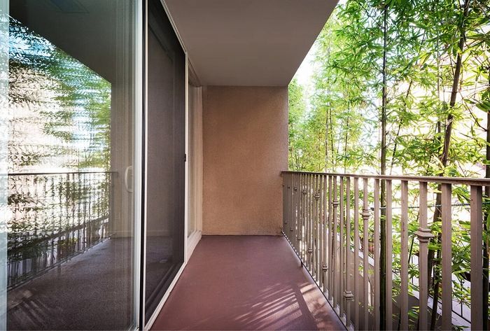 Private resident patio/balcony with views of lush trees at Elan - bella mer coronado.