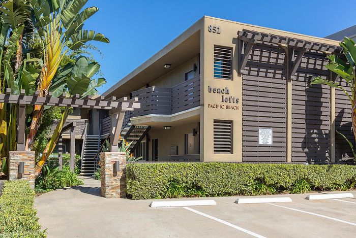 Beach Lofts monument sign and resident parking area at Elan - beachlofts del mar