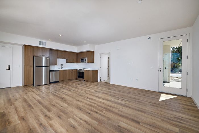 open layout living room and kitchen at Dezi