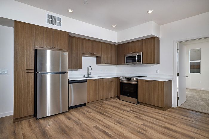 open layout living room and kitchen at Dezi