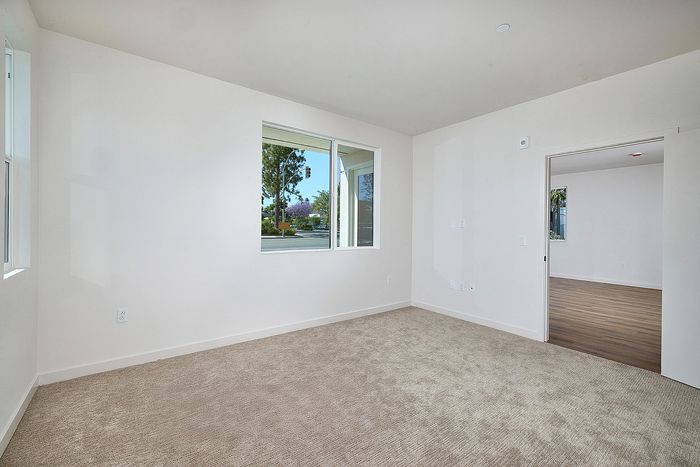 bedroom with plush carpet at Dezi