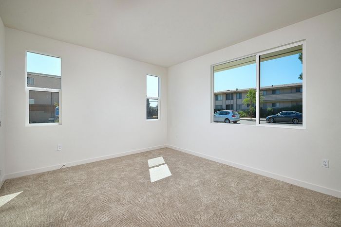 bedroom with plush carpet at Dezi