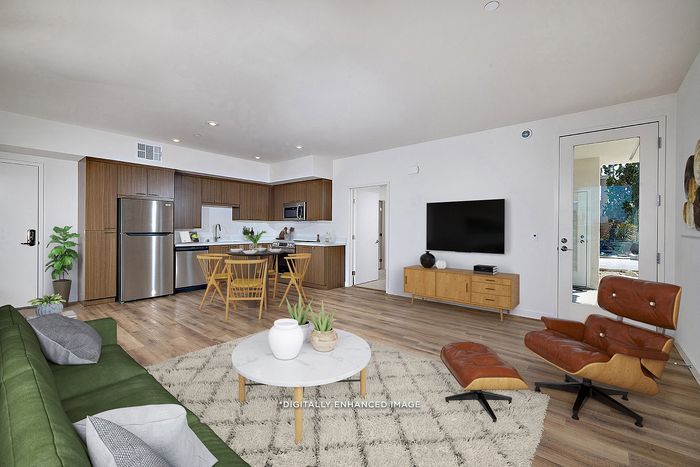 virtually staged large living room and kitchen