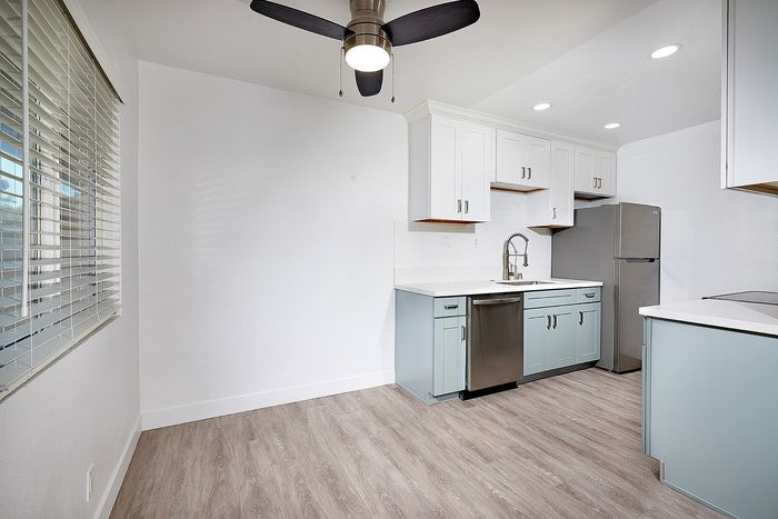 dining area with wood-like flooring at Elivia