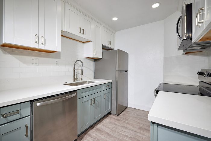 kitchen with wood-like flooring at Elivia