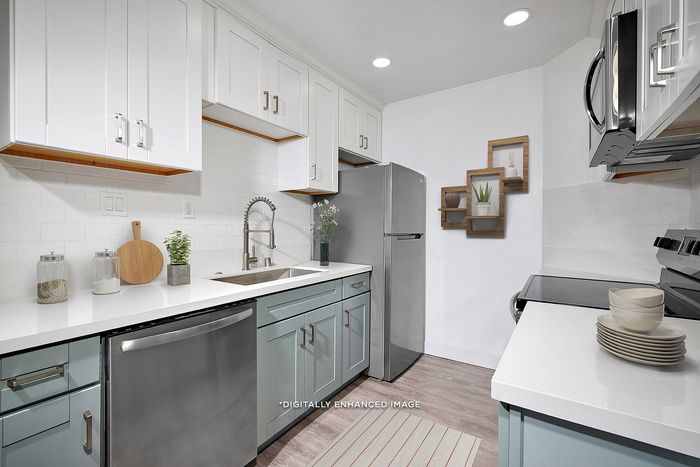 virtually staged kitchen with stainless steel appliances