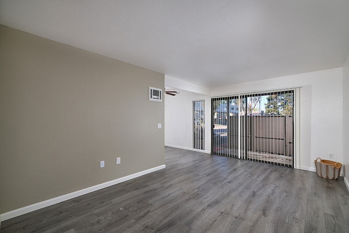 Living room with wood-like flooring at Canyon Park