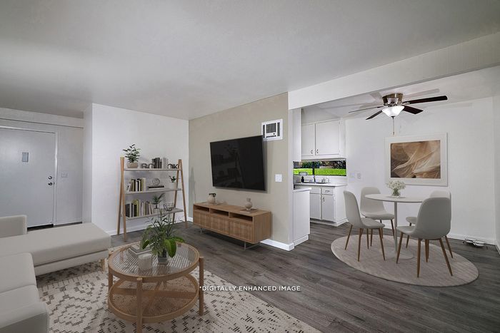 Virtually staged living room and kitchen