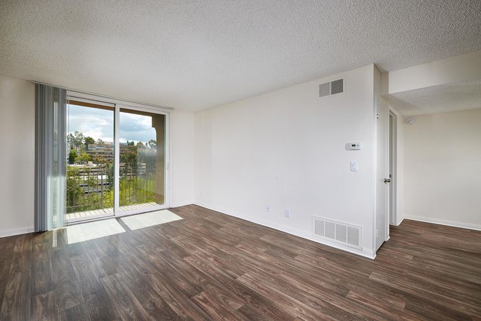living room with wood-like flooring at mellmanor