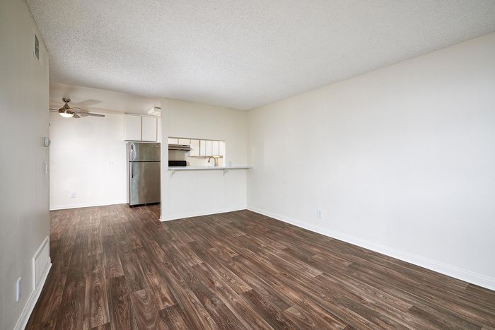 living room with wood-like flooring at mellmanor