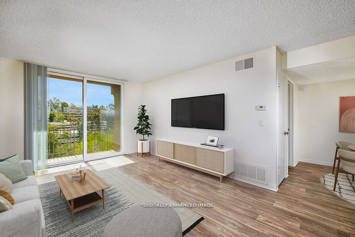 Virtually Staged Image - Living area with patio out to the balcony with wonderful views