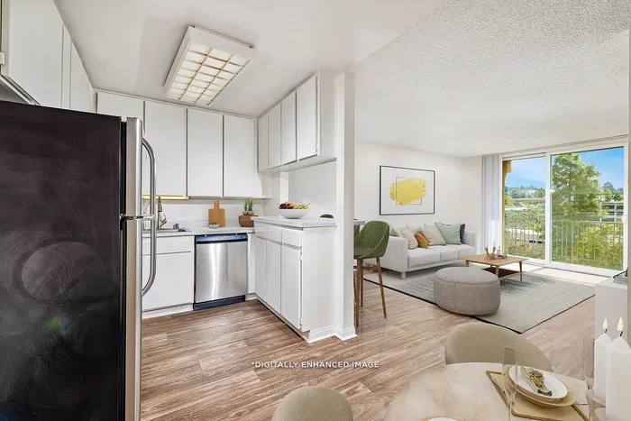 Virtually Staged Image - Kitchen and living area with ceiling fan and balcony