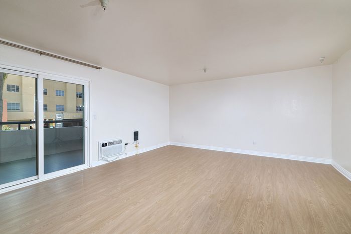 apartment living room with wooden floors