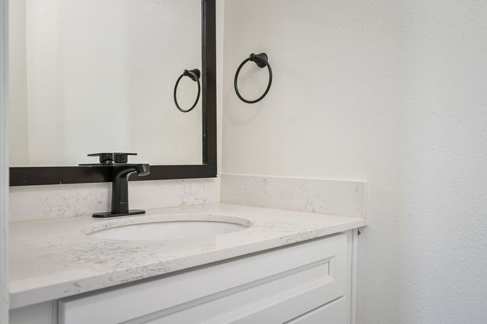 Bathroom Countertop with black fixtures