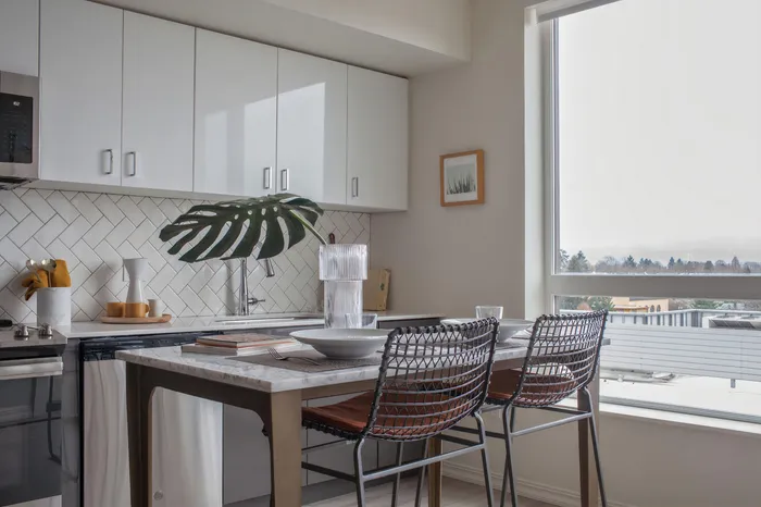 Kitchen with quartz countertops and stainless steel appliances