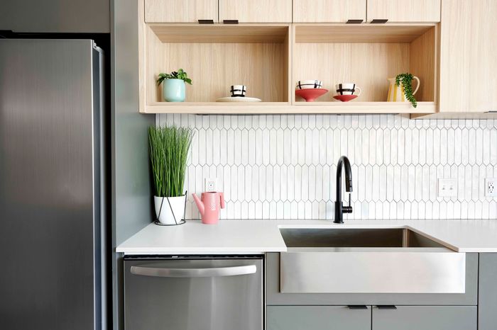 Apartments in Portland for Rent- Novus- Open Kitchen Floor Plan With Light Wooden Cabinets and Stainless-Steel Appliances