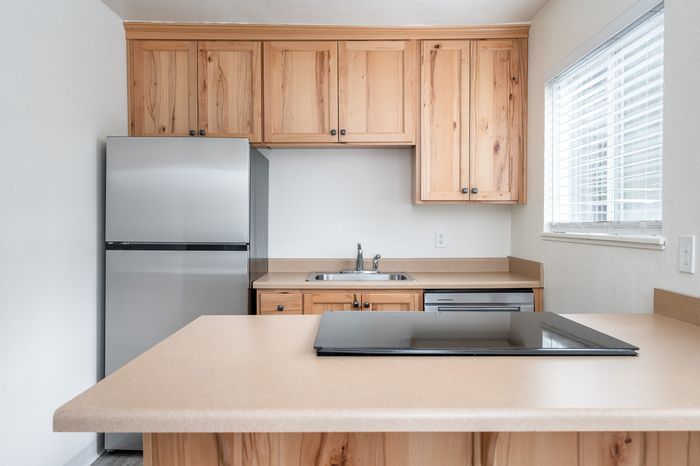 Kitchen with wood cabinets