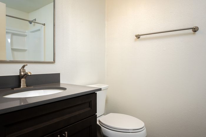 bathroom with vanity and upgraded fixtures