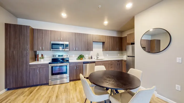 Full kitchen with stainless steel appliances