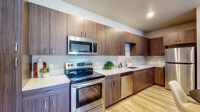 Full kitchen with stainless steel appliances